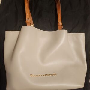Dooney and Bourke winter white never used.